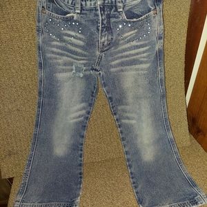 jeans revolt 100% cotton size 6 with jewel heart shape on front pockets